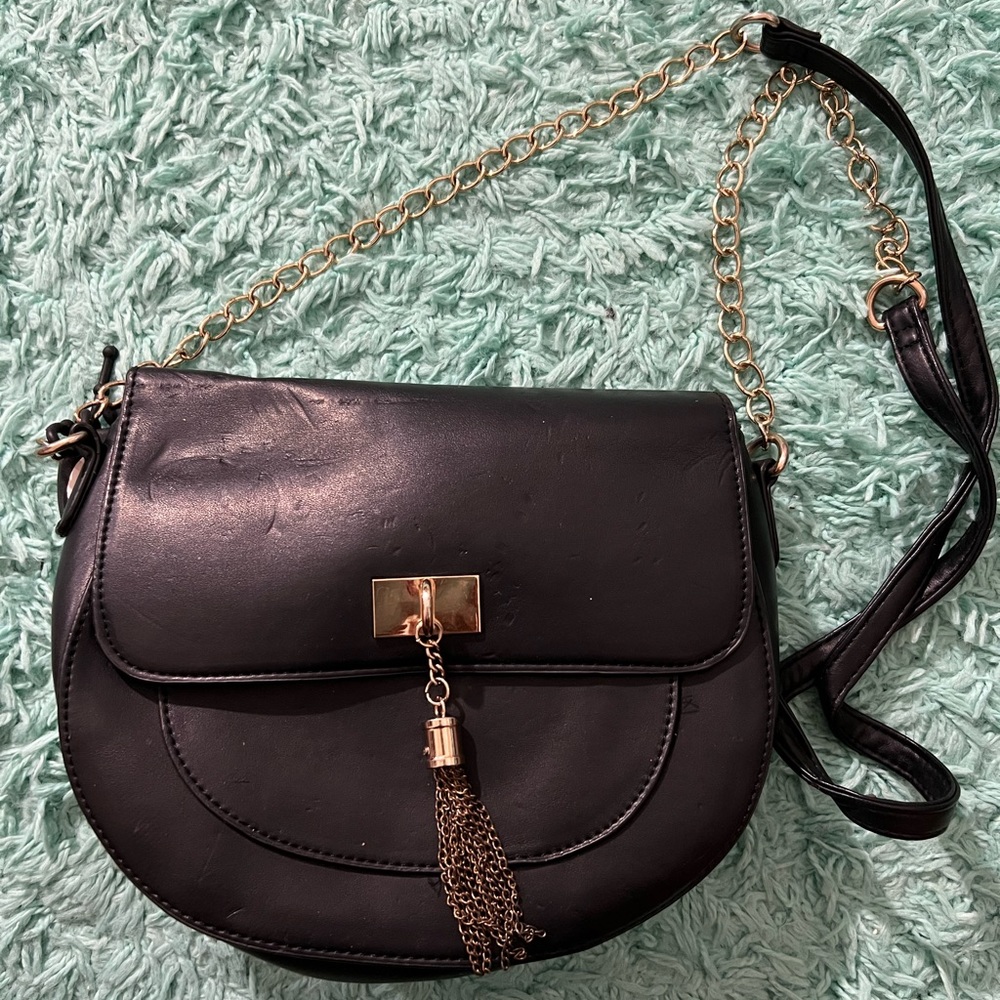 Black rounded handbag